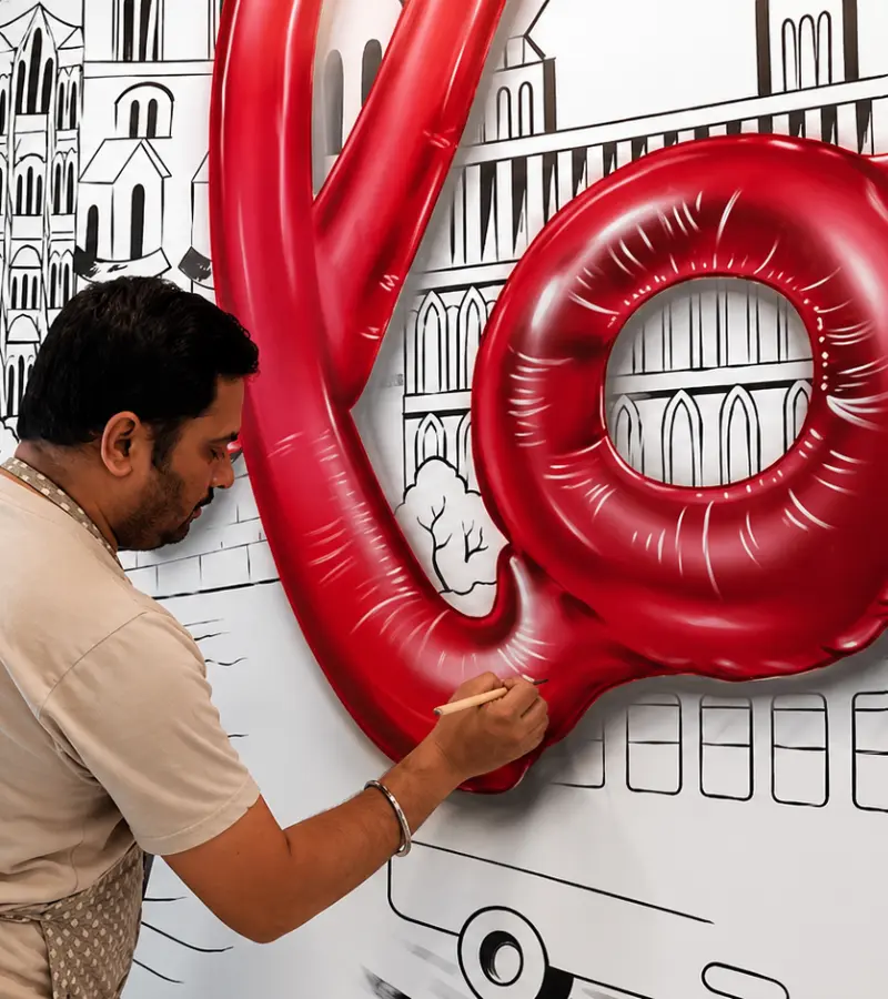 Wall Art Mumbai husband and wife artist duo painting a wall mural
